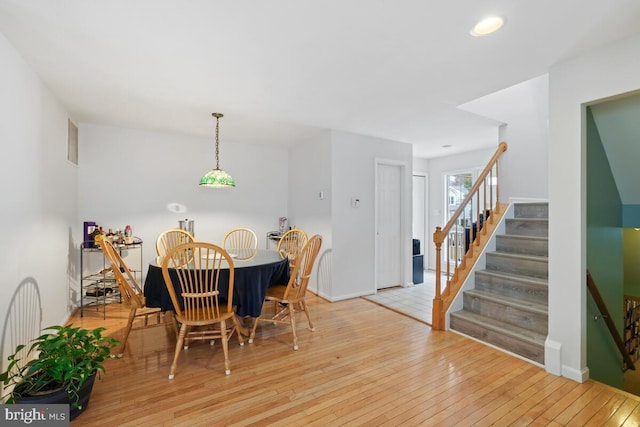 dining space featuring light hardwood / wood-style floors