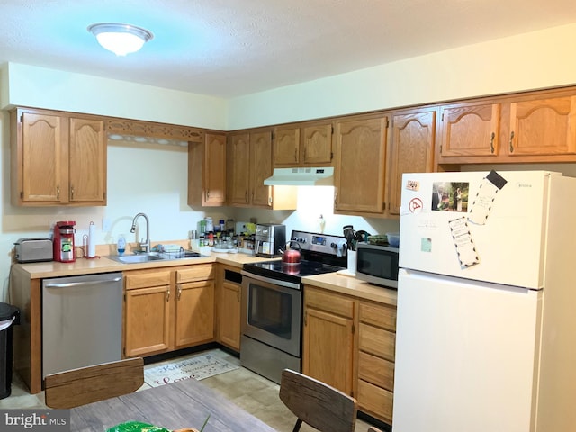 kitchen featuring appliances with stainless steel finishes and sink