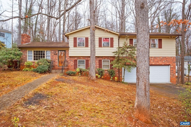 split level home featuring a garage