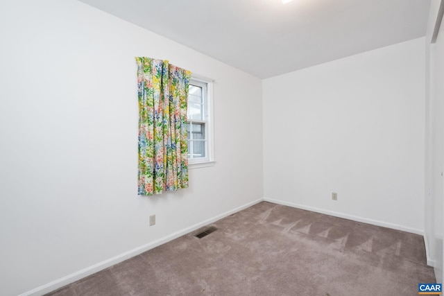 view of carpeted spare room