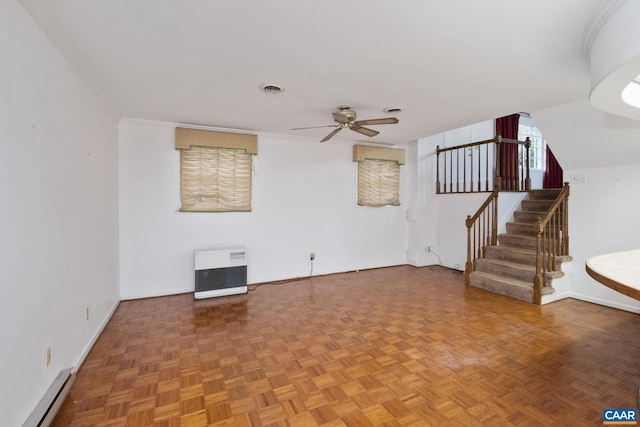 unfurnished living room with heating unit, a baseboard heating unit, parquet flooring, and ceiling fan