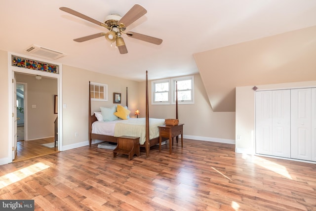 bedroom featuring ceiling fan and light hardwood / wood-style floors