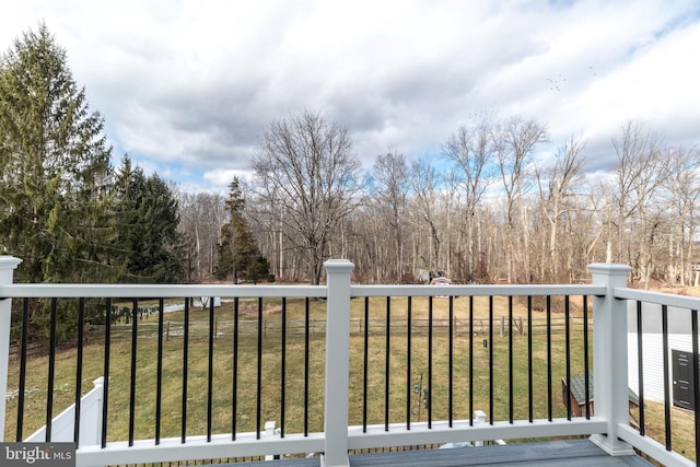 wooden deck with a yard