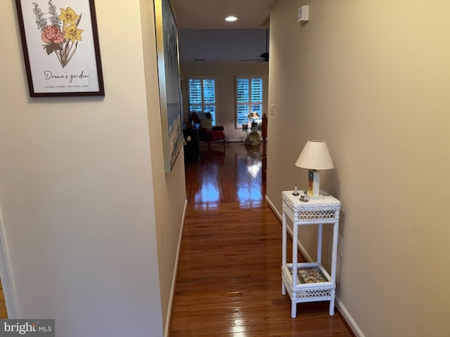 hall with dark wood-type flooring