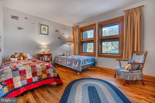 bedroom featuring wood finished floors