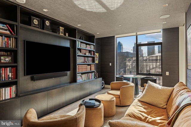 living room with floor to ceiling windows and built in shelves