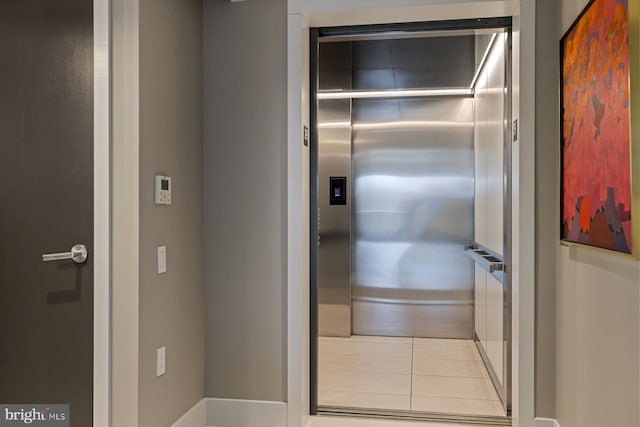 bathroom featuring elevator