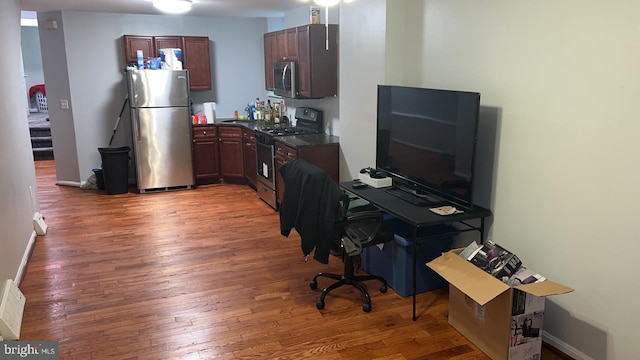 office space with dark hardwood / wood-style floors