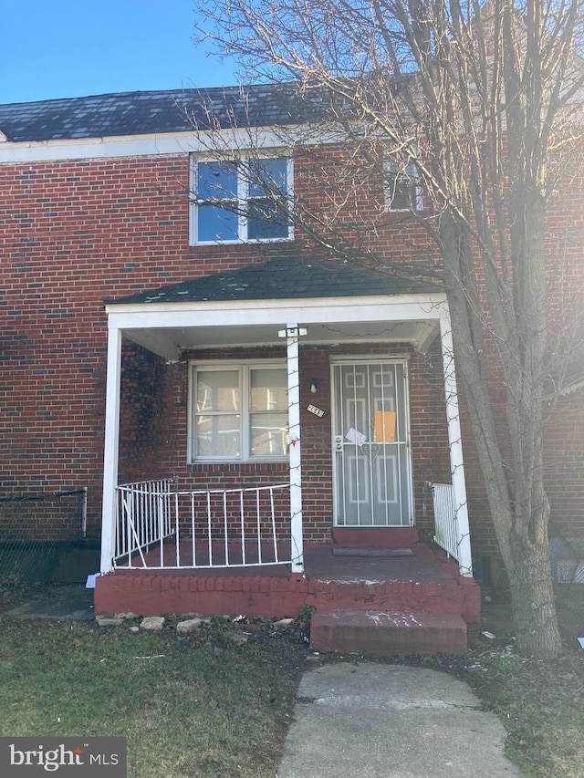 entrance to property with a porch