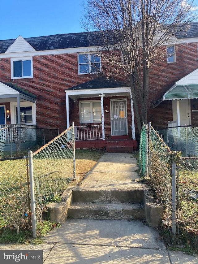 multi unit property featuring a porch