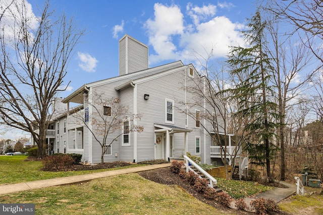 exterior space featuring a front yard