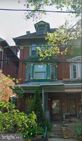 view of front facade featuring covered porch