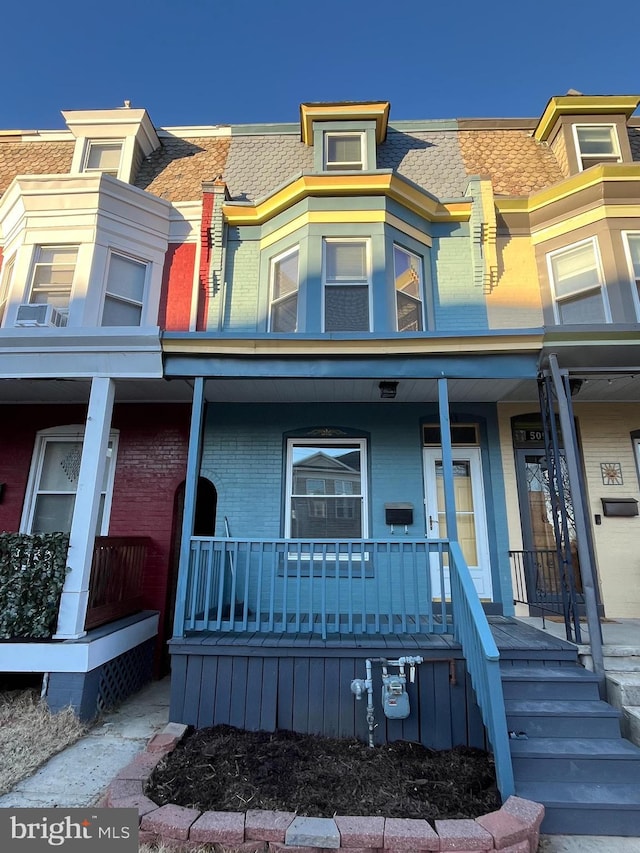 multi unit property featuring covered porch