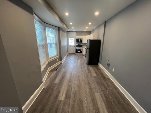 interior space featuring dark hardwood / wood-style floors