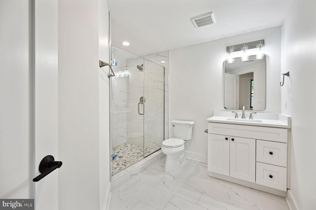 bathroom featuring marble finish floor, a marble finish shower, visible vents, toilet, and baseboards