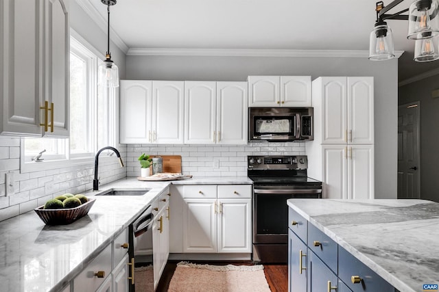 kitchen with sink, blue cabinetry, stainless steel appliances, light stone countertops, and white cabinets