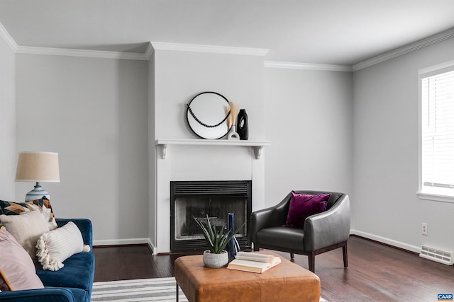 living room featuring crown molding and dark wood-type flooring