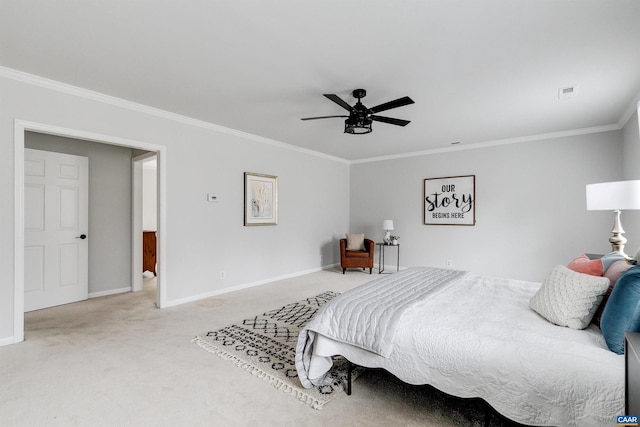 carpeted bedroom with crown molding and ceiling fan