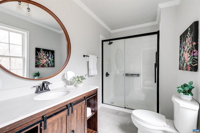 bathroom featuring vanity, ornamental molding, toilet, and walk in shower