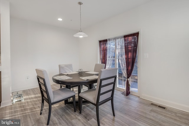 dining area featuring recessed lighting, visible vents, baseboards, and wood finished floors