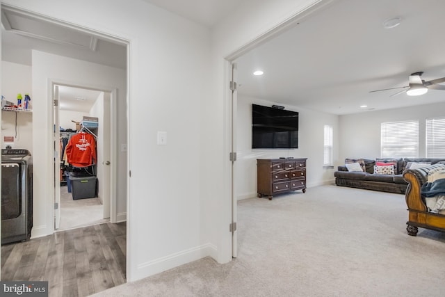 living area featuring a ceiling fan, baseboards, washer / dryer, recessed lighting, and carpet flooring