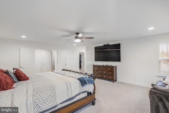 bedroom with recessed lighting, baseboards, light colored carpet, and ceiling fan