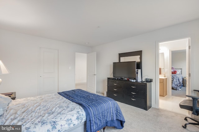 bedroom featuring light colored carpet