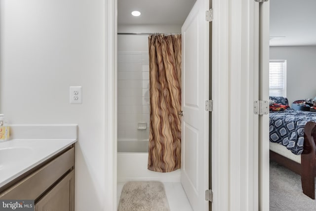 full bathroom with vanity, recessed lighting, tile patterned flooring, shower / bath combo with shower curtain, and ensuite bathroom