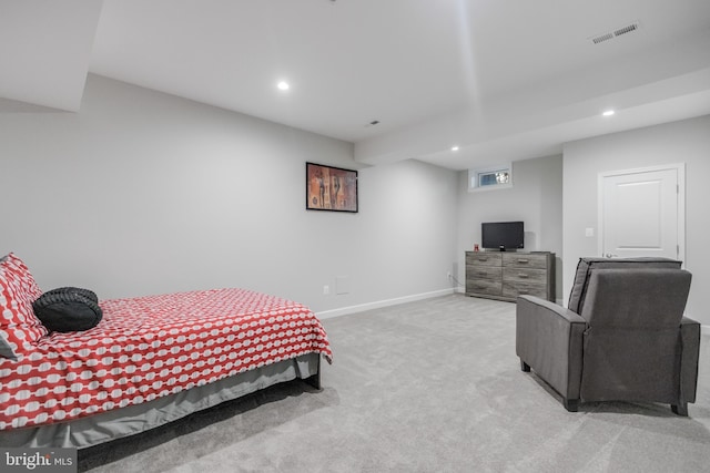 carpeted bedroom featuring recessed lighting, visible vents, and baseboards