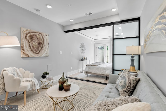 bedroom with light hardwood / wood-style floors