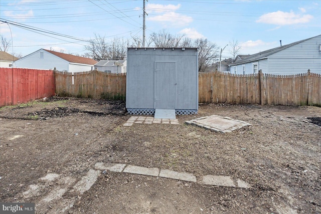 exterior space with a shed