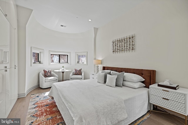 bedroom featuring light hardwood / wood-style floors