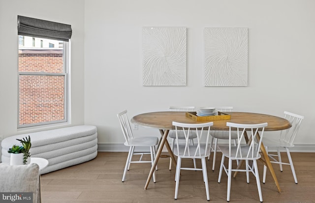 dining room with light wood-type flooring