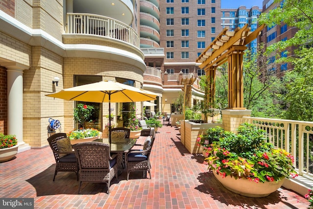 view of patio with a balcony