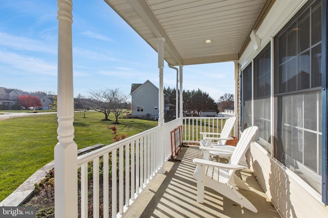 balcony featuring covered porch