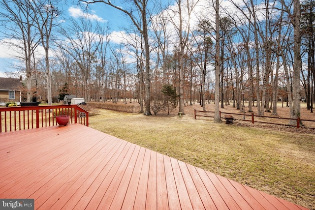 deck featuring a lawn