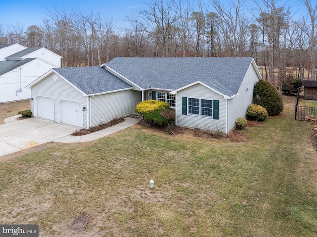 single story home with a garage and a front lawn