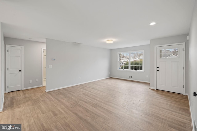 interior space with light hardwood / wood-style flooring