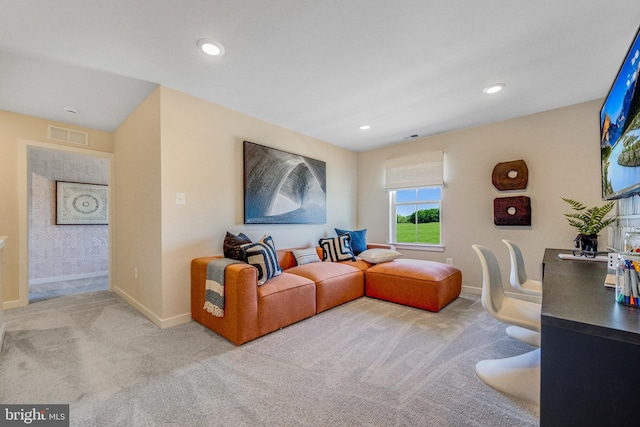 living room featuring light carpet