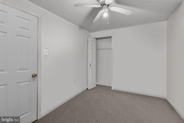 unfurnished bedroom featuring light colored carpet, a closet, and ceiling fan