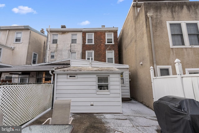 rear view of property with a patio