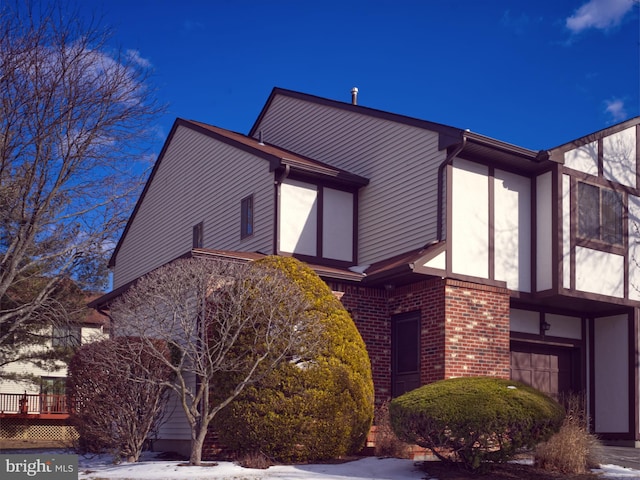 view of home's exterior featuring a garage