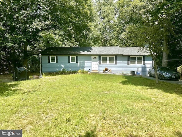 ranch-style house with a front yard