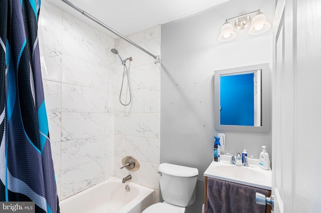 full bathroom featuring shower / bath combination with curtain, vanity, and toilet