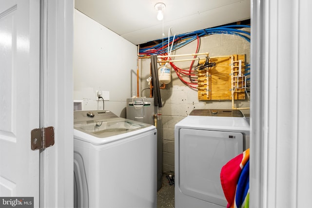 laundry room with washer and clothes dryer