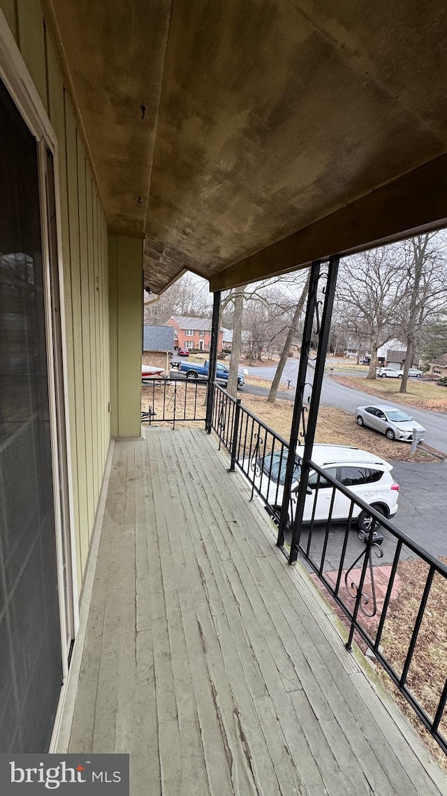 wooden terrace featuring a porch