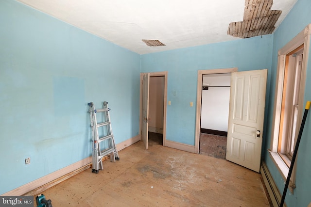 unfurnished bedroom with visible vents and baseboards