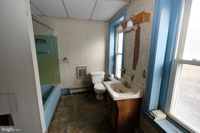 bathroom featuring a baseboard heating unit, vanity, and wallpapered walls