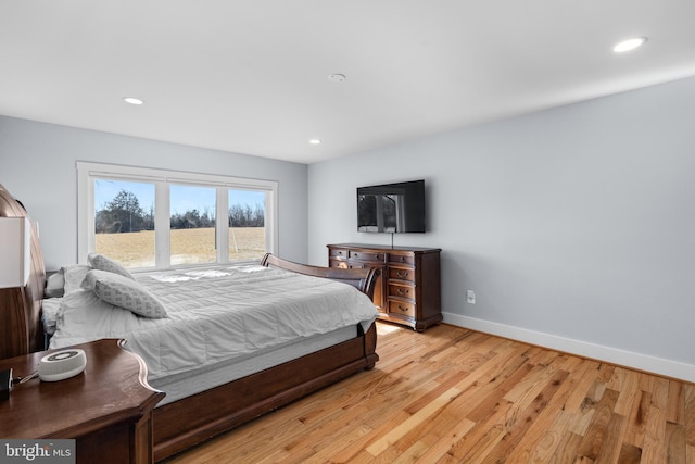 bedroom featuring light hardwood / wood-style floors