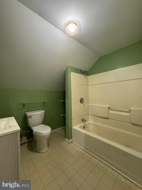 full bathroom with vaulted ceiling, shower / bath combination, tile patterned flooring, vanity, and toilet